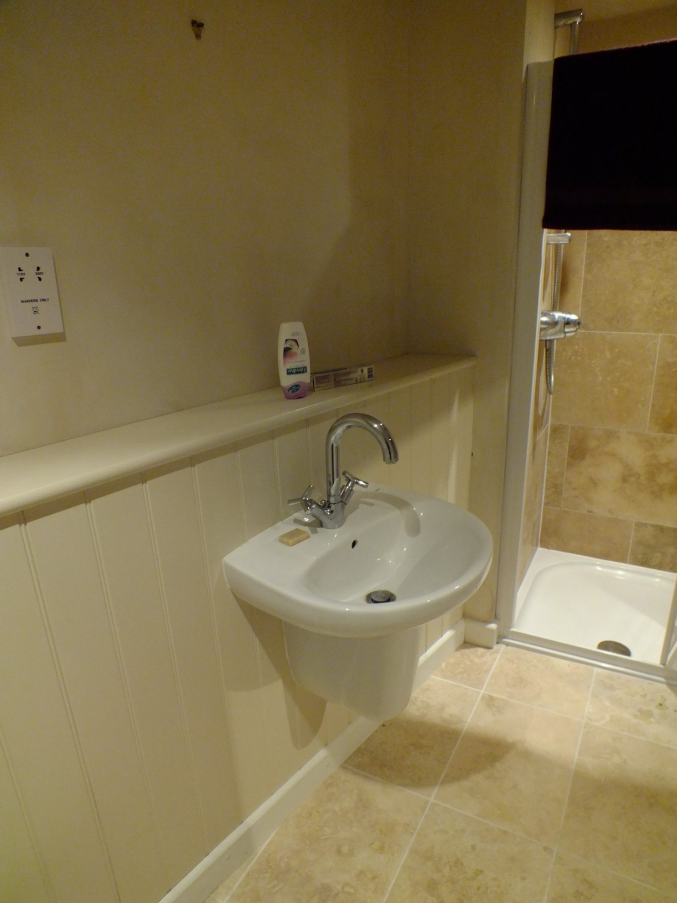 Original sink Small bathroom with a wall-mounted sink.